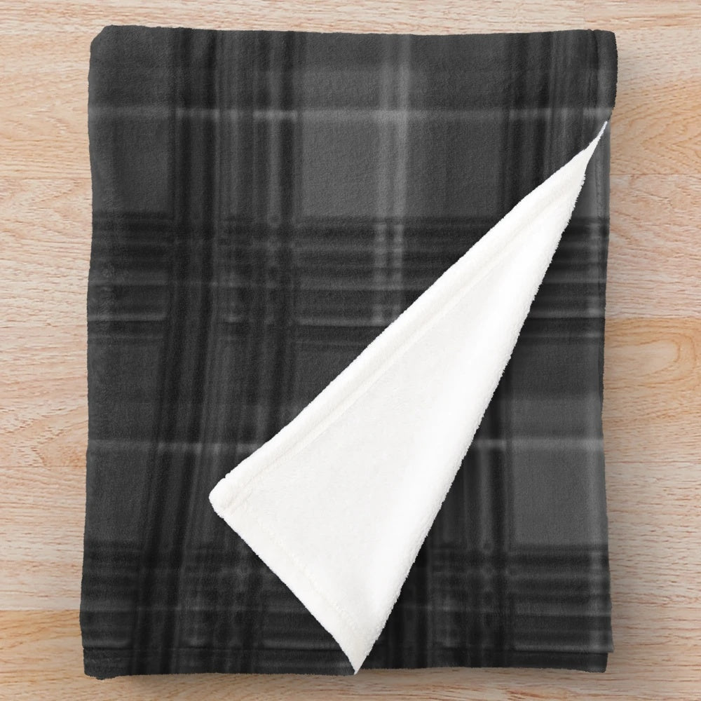 Dark grey and black tartan pattern plush blanket