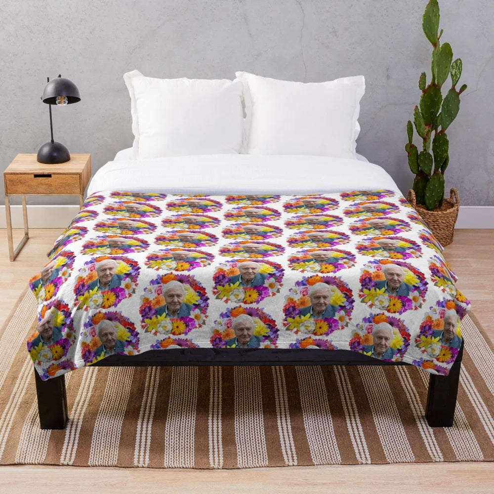 David Attenborough inspired plush blanket with nature and wildlife design
