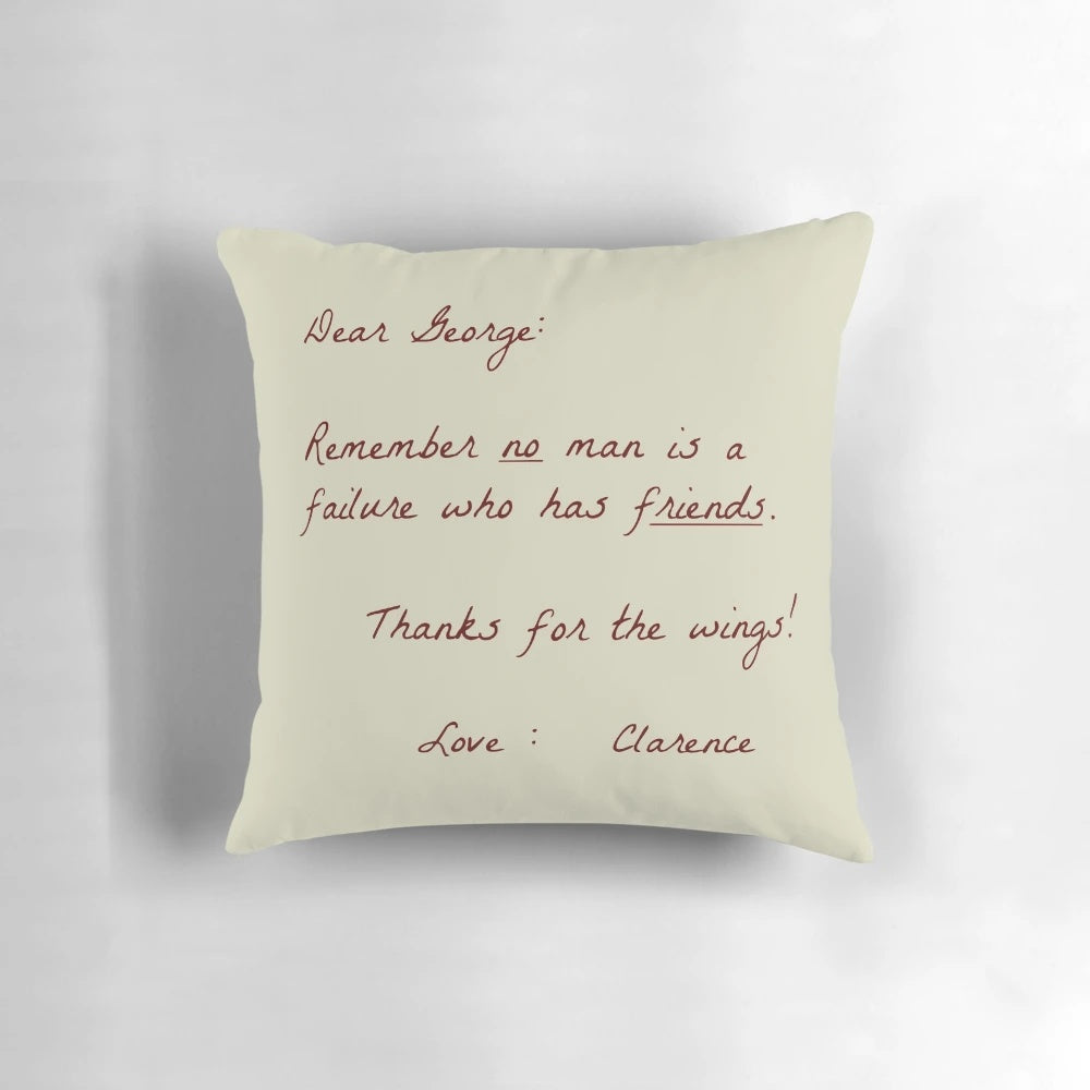Dear George" Christmas-themed pillow with holiday icons