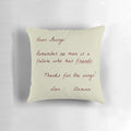 Dear George" Christmas-themed pillow with holiday icons