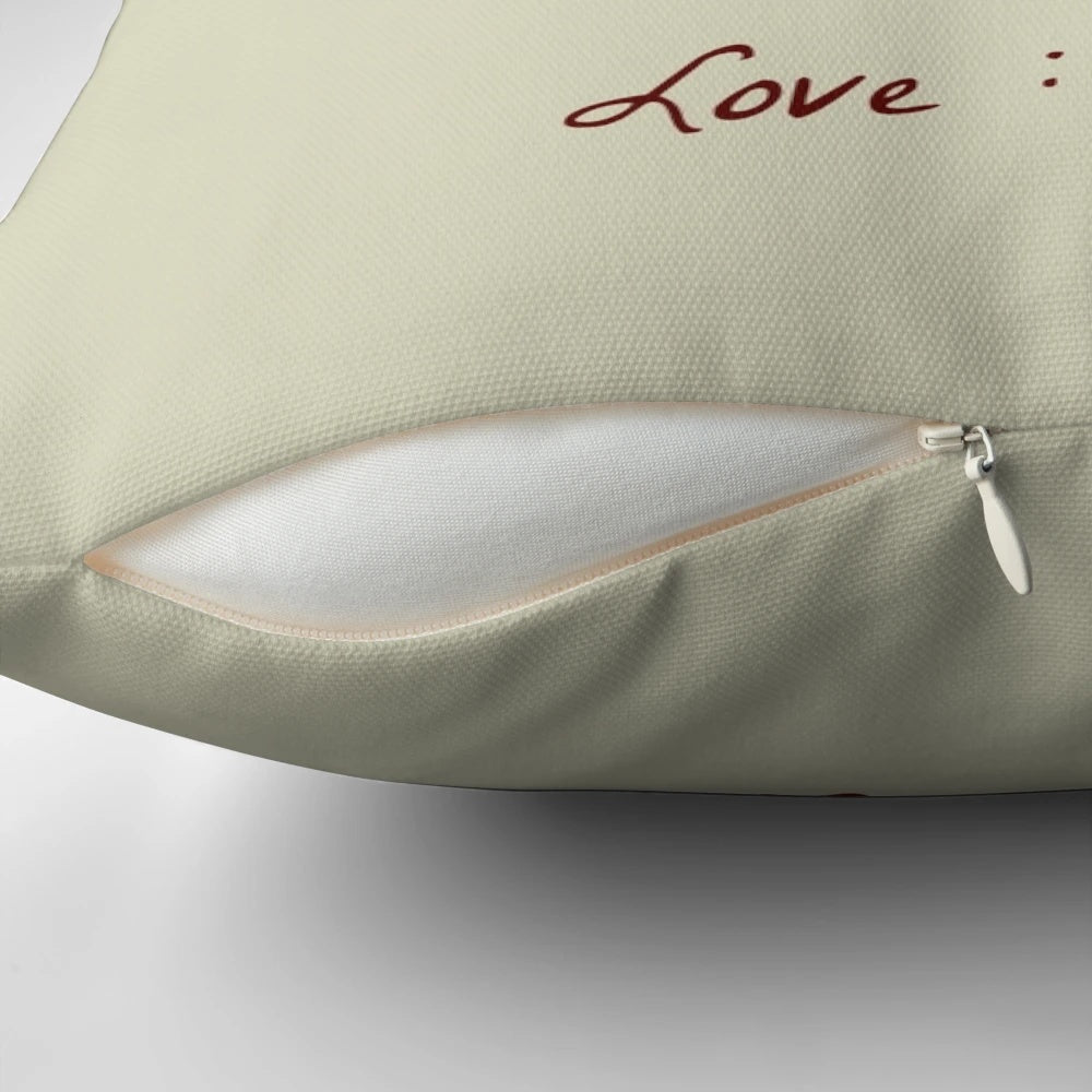 Dear George" Christmas-themed pillow with holiday icons
