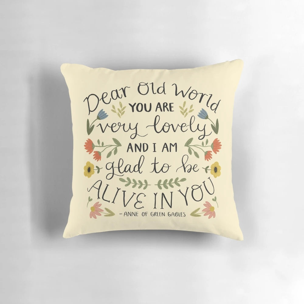 Anne of Green Gables inspired decorative throw pillow with 'Dear Old World' quote and floral design