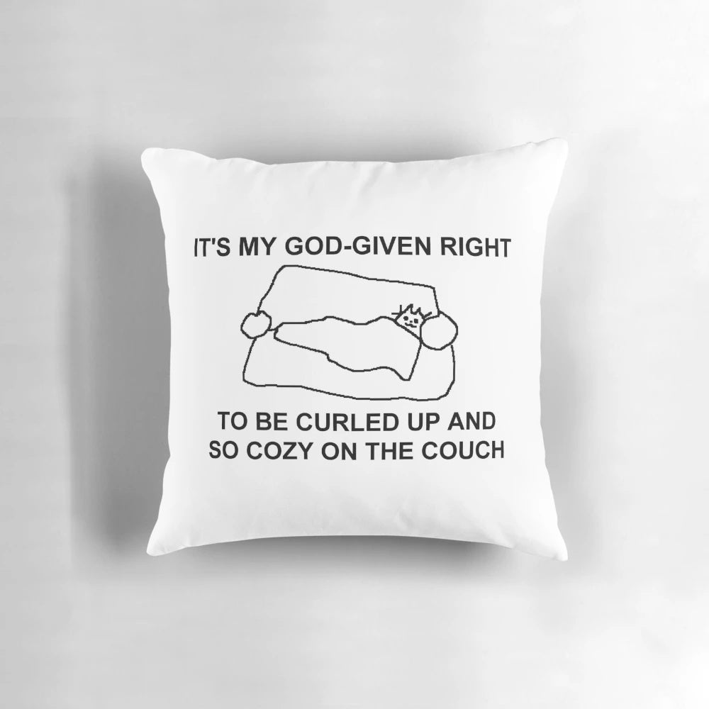 A cozy decorative pillow featuring a pixel art design of a cat on a couch.