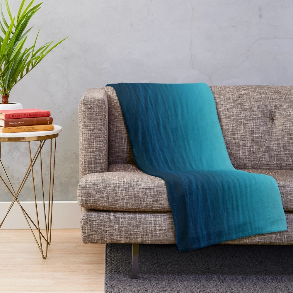 Deep blue plush blanket with ocean waves design