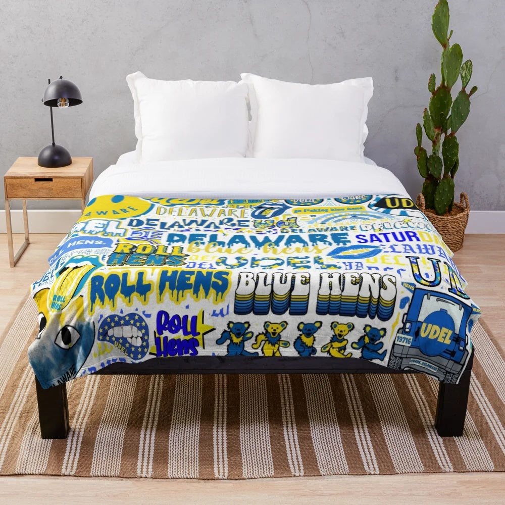 Soft and plush blanket featuring a collage design inspired by the University of Delaware and the Blue Hens mascot.