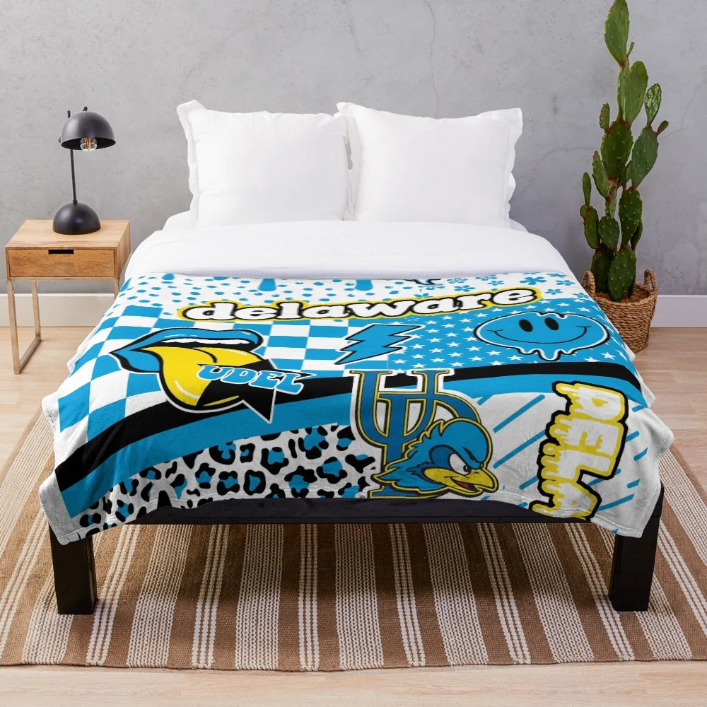 Soft and comfortable plush blanket featuring a delaware-inspired design