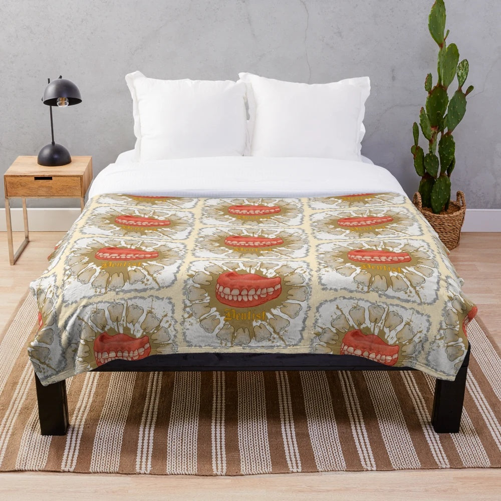 Dentist plush blanket with dental motifs