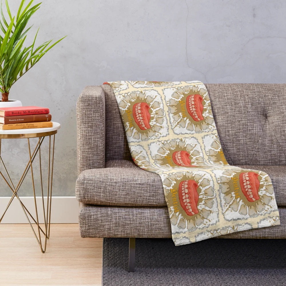 Dentist plush blanket with dental motifs