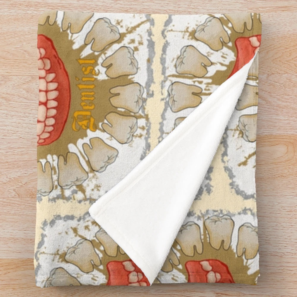 Dentist plush blanket with dental motifs