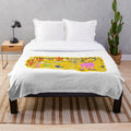 Plush blanket featuring an elk in a desert cactus scene