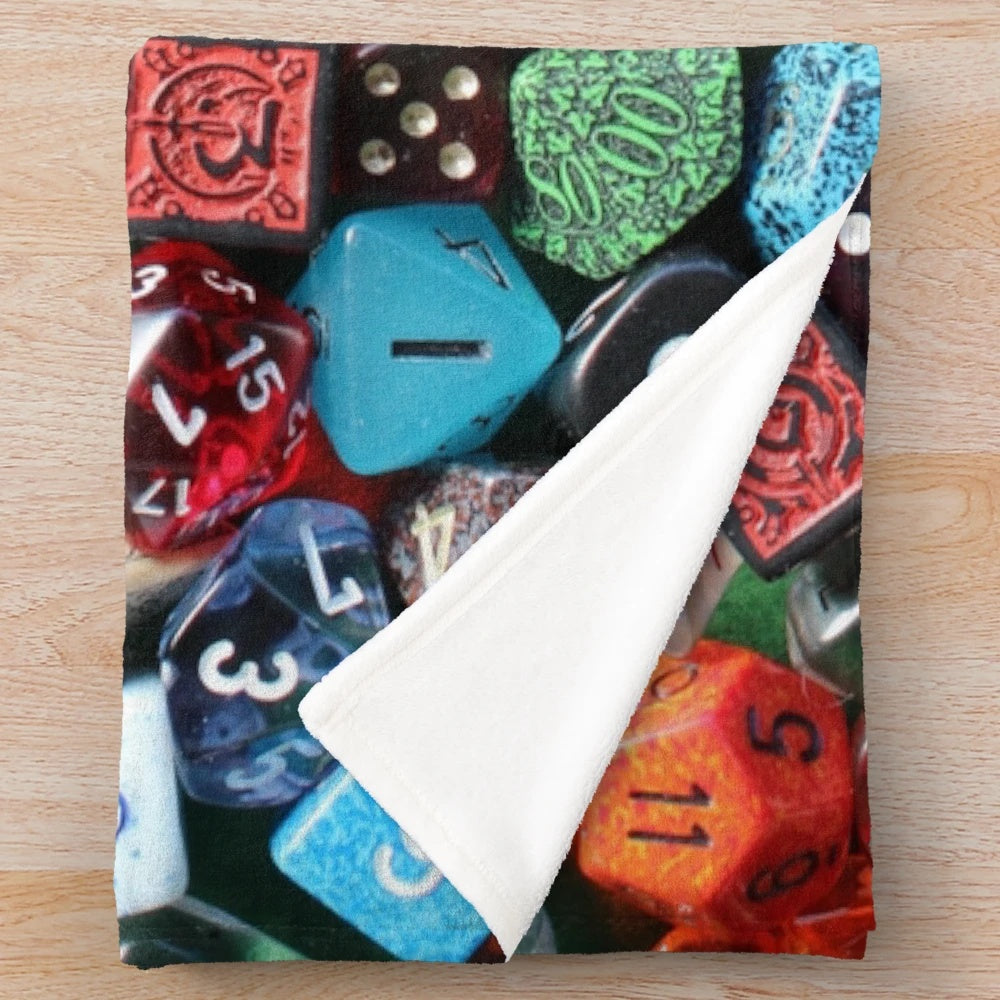Plush dice-themed blanket for tabletop gaming enthusiasts