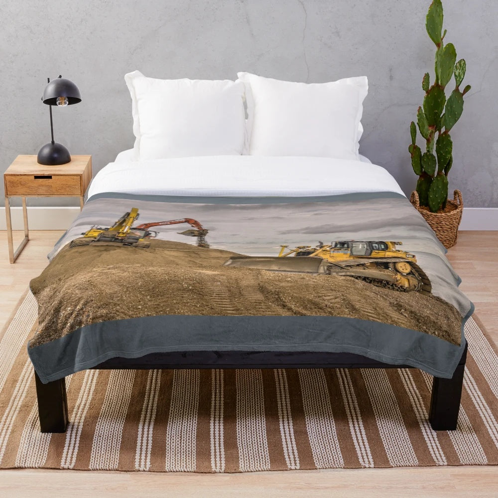 Plush blanket with digging machine, excavator, and bulldozer design