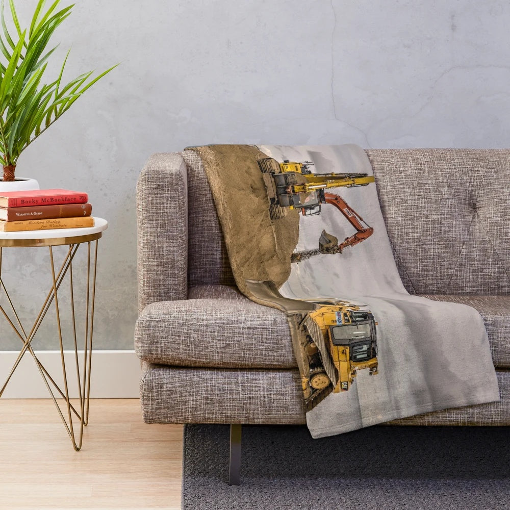 Plush blanket with digging machine, excavator, and bulldozer design