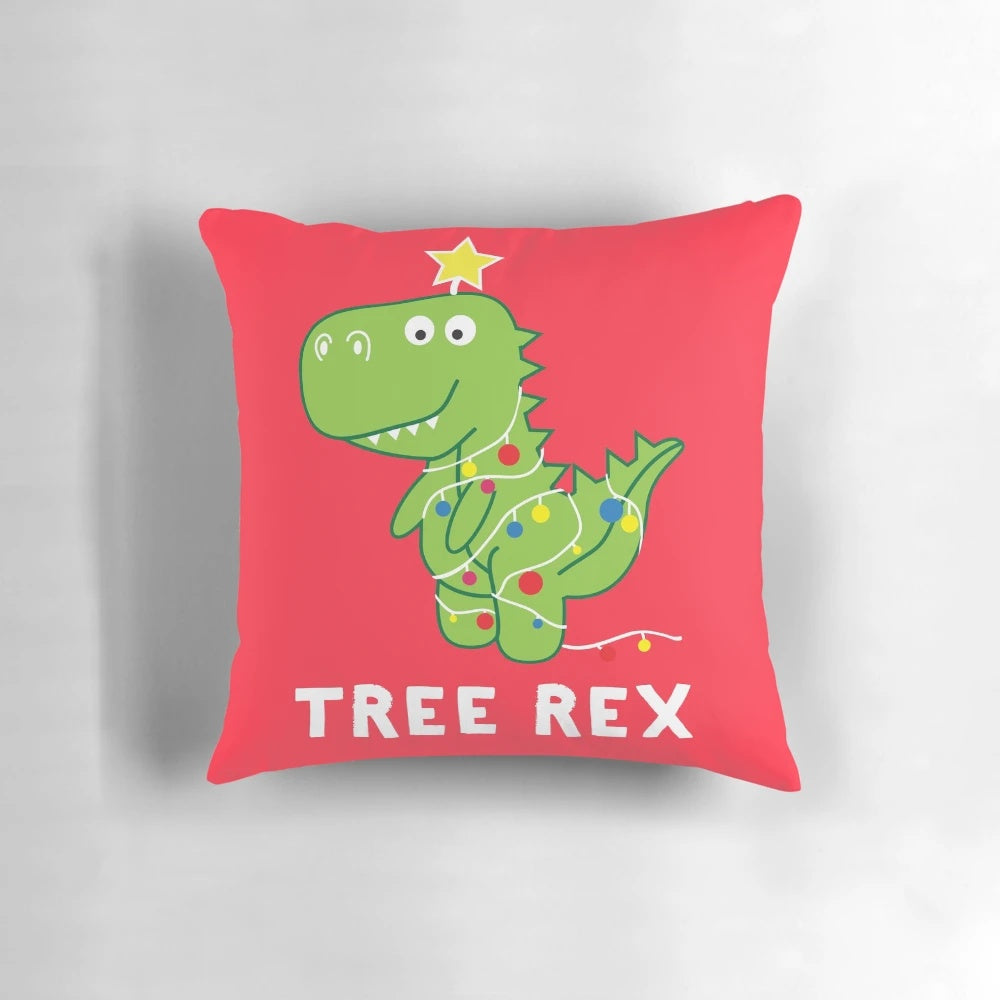 Plush, festive dinosaur pillow with a playful "Tree Rex" design, perfect for holiday decor and gifts.