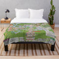 Plush blanket featuring a detailed map of the Magic Kingdom theme park