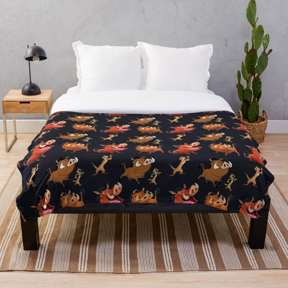 Pumba and Timon Disney cartoon characters on a plush blanket