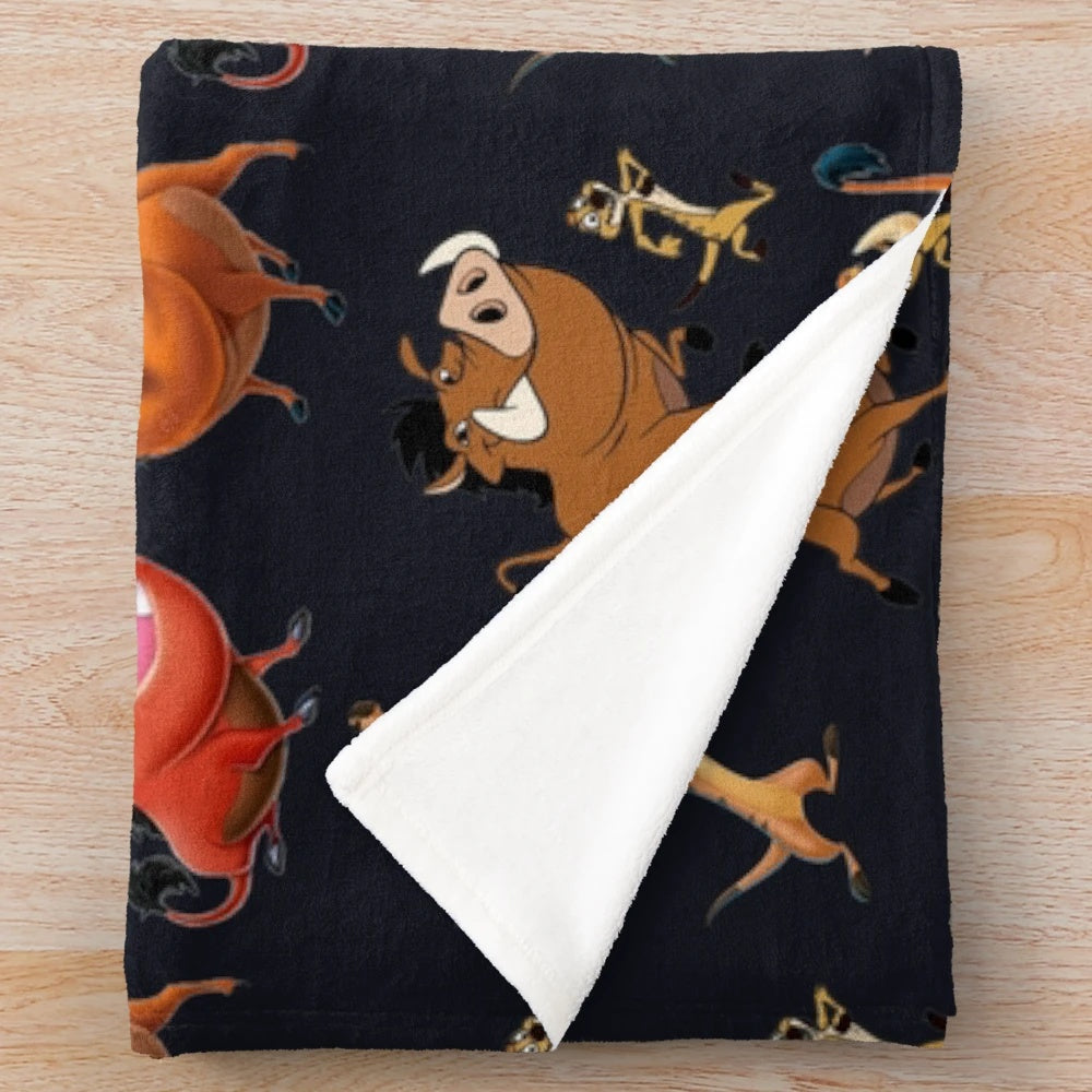 Pumba and Timon Disney cartoon characters on a plush blanket