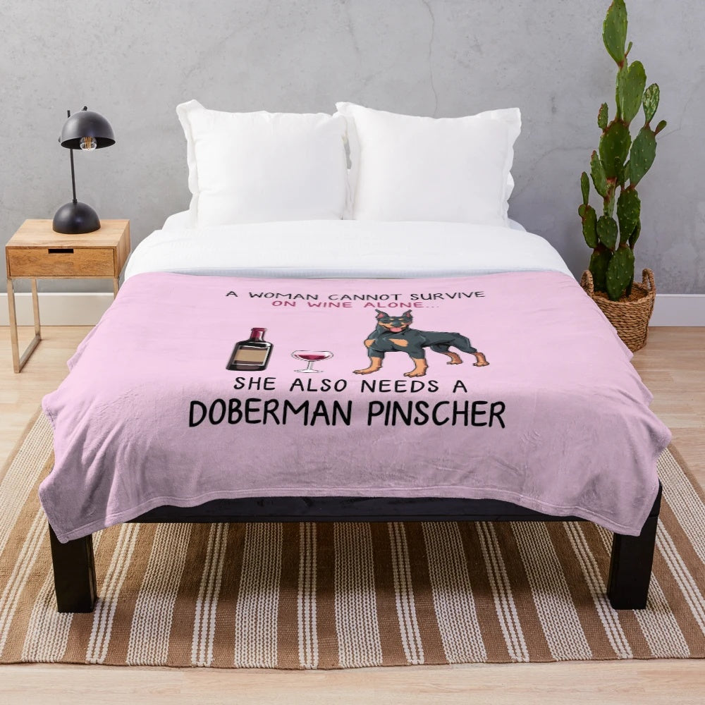 Doberman Pinscher and wine-themed plush blanket for dog lovers