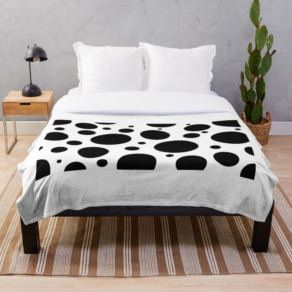 Soft, plush blanket with a charming dog pattern design