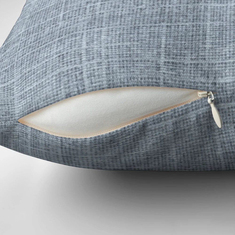 A gray and white decorative pillow with a playful "No Humans on the Sofa" dog-themed design.
