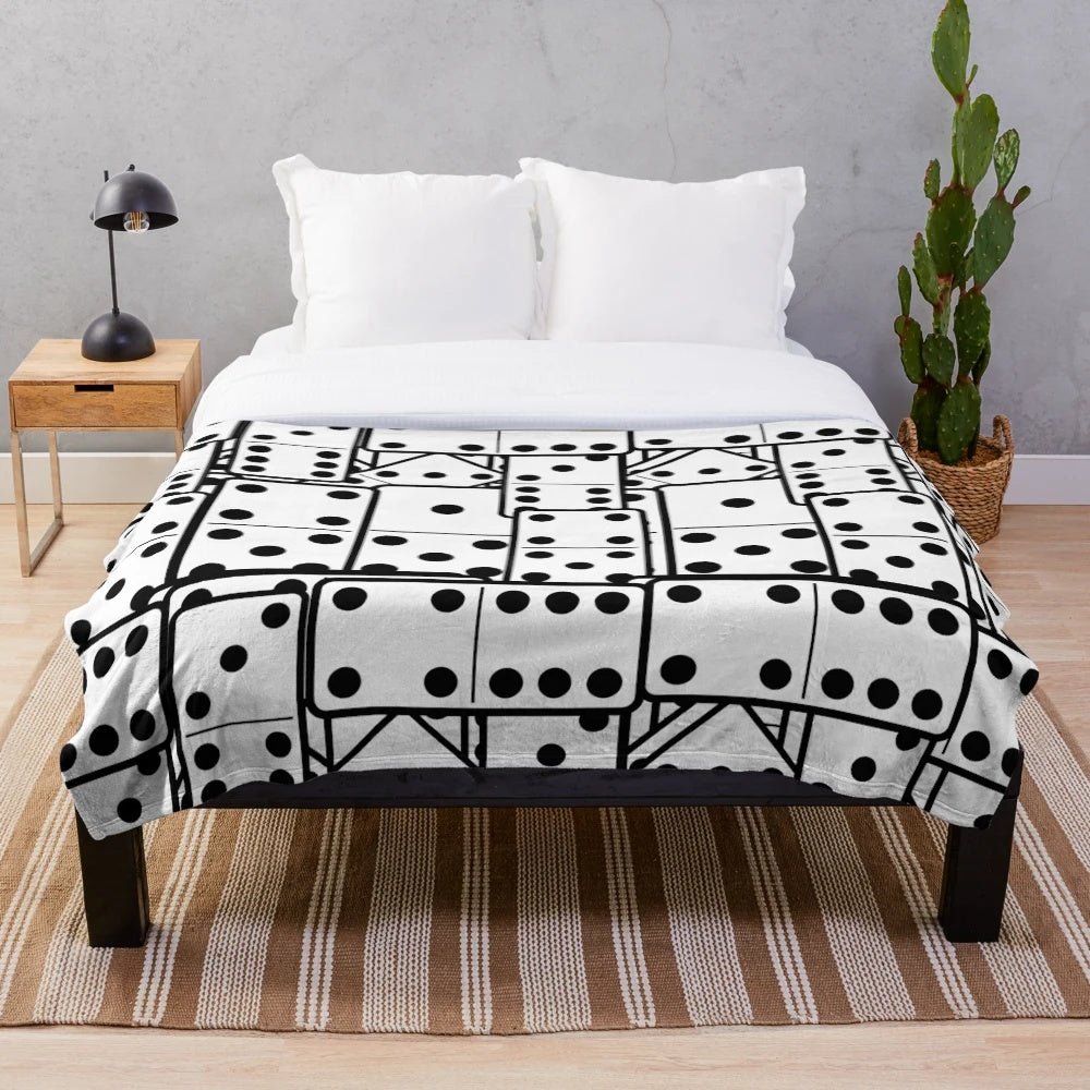 Dominoes-themed plush blanket in black and white colors