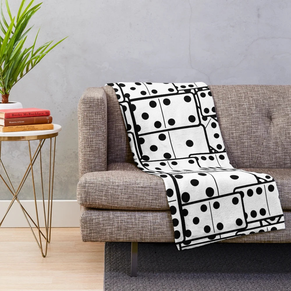 Dominoes-themed plush blanket in black and white colors