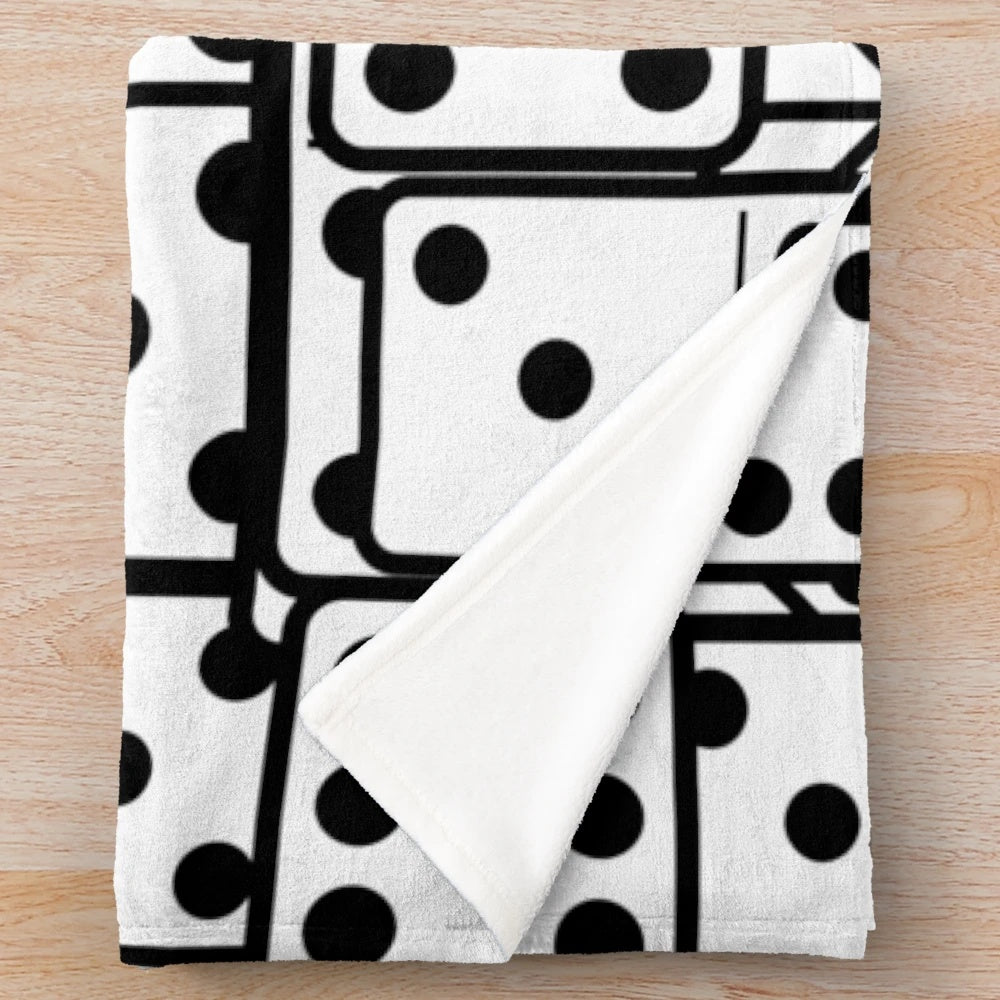 Dominoes-themed plush blanket in black and white colors