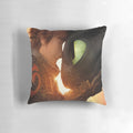 A plush pillow featuring Toothless the dragon and Hiccup from the How to Train Your Dragon movie franchise.