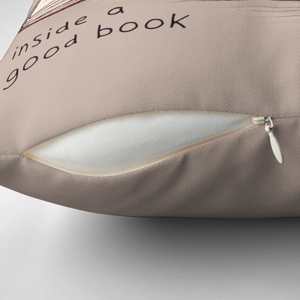 A soft, plush dragon-shaped pillow with a book-inspired design, perfect for creating a cozy, magical atmosphere.