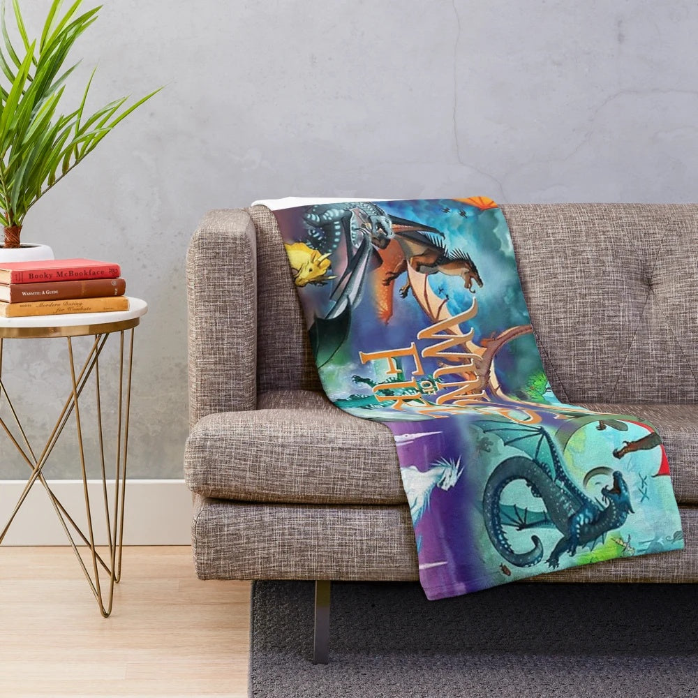 Soft and cozy dragon plush blanket with characters from the Wings of Fire book series