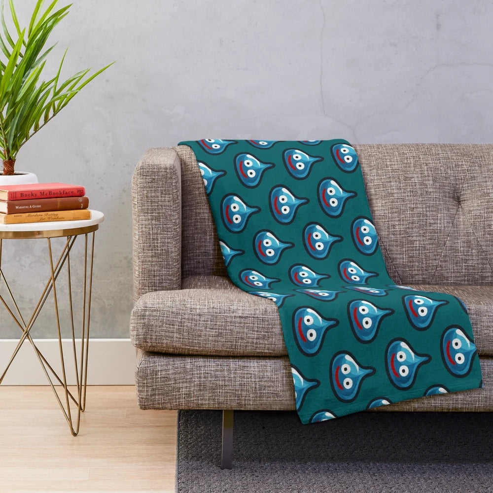 Dragon Quest-inspired plush blanket featuring a cute slime character
