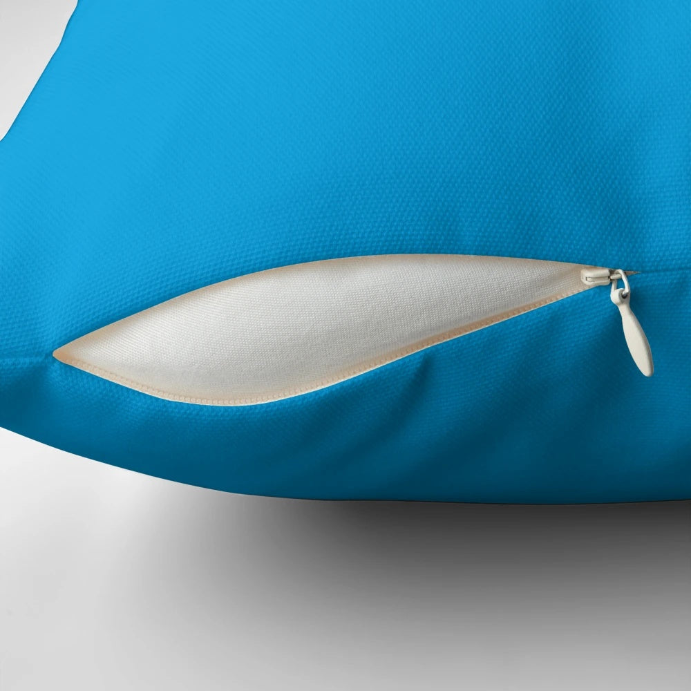 A soft, plush pillow shaped like a Dragon Quest slime character, perfect for video game fans.