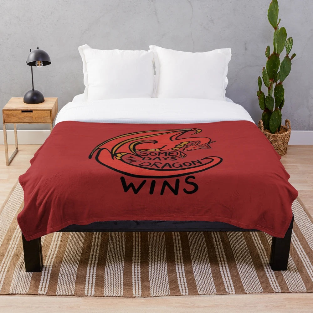 Cozy dragon plush blanket featuring a red dragon design