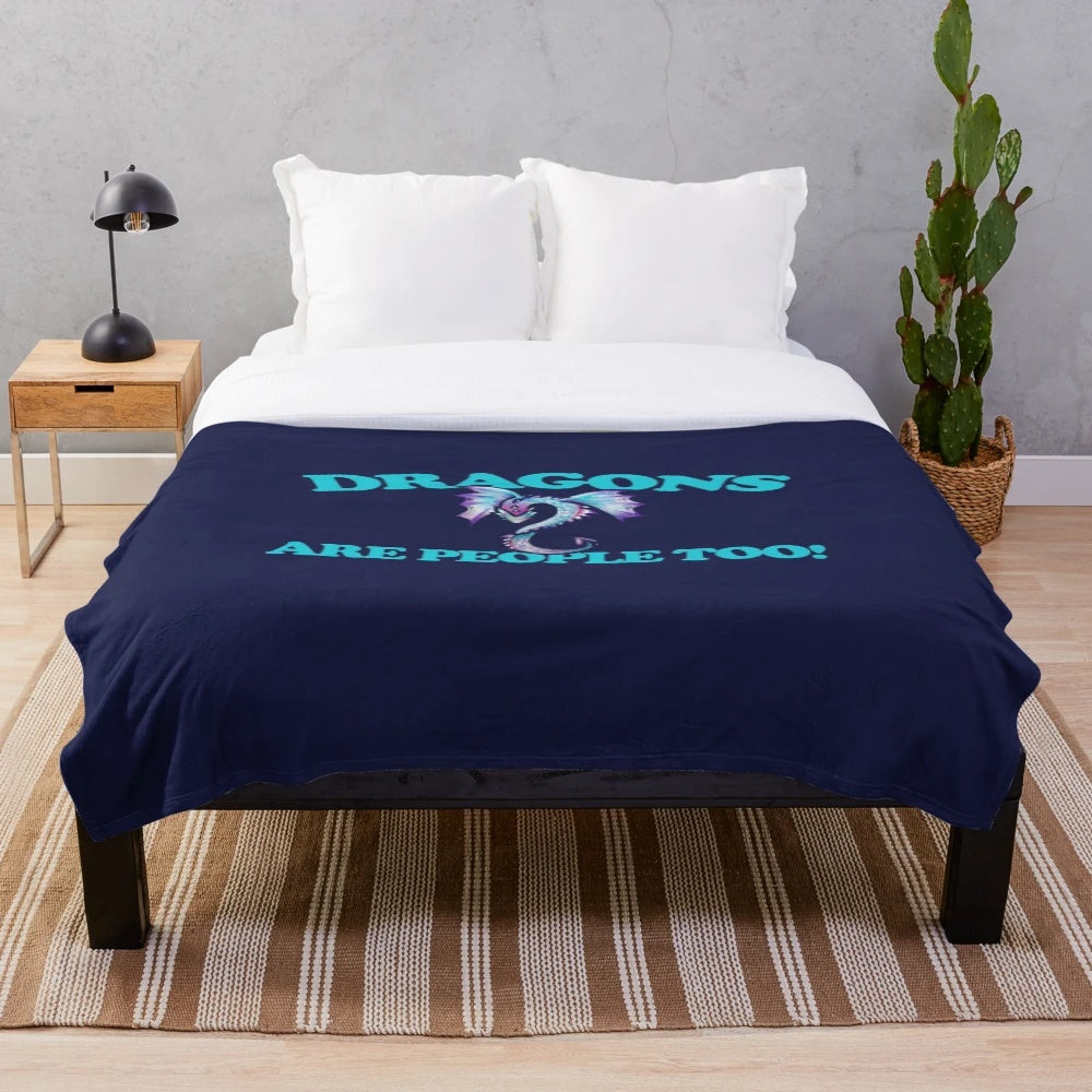 Soft and fluffy plush blanket with a dragon design, perfect for fantasy and geeky home decor