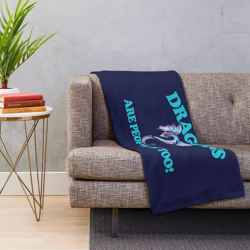 Soft and fluffy plush blanket with a dragon design, perfect for fantasy and geeky home decor