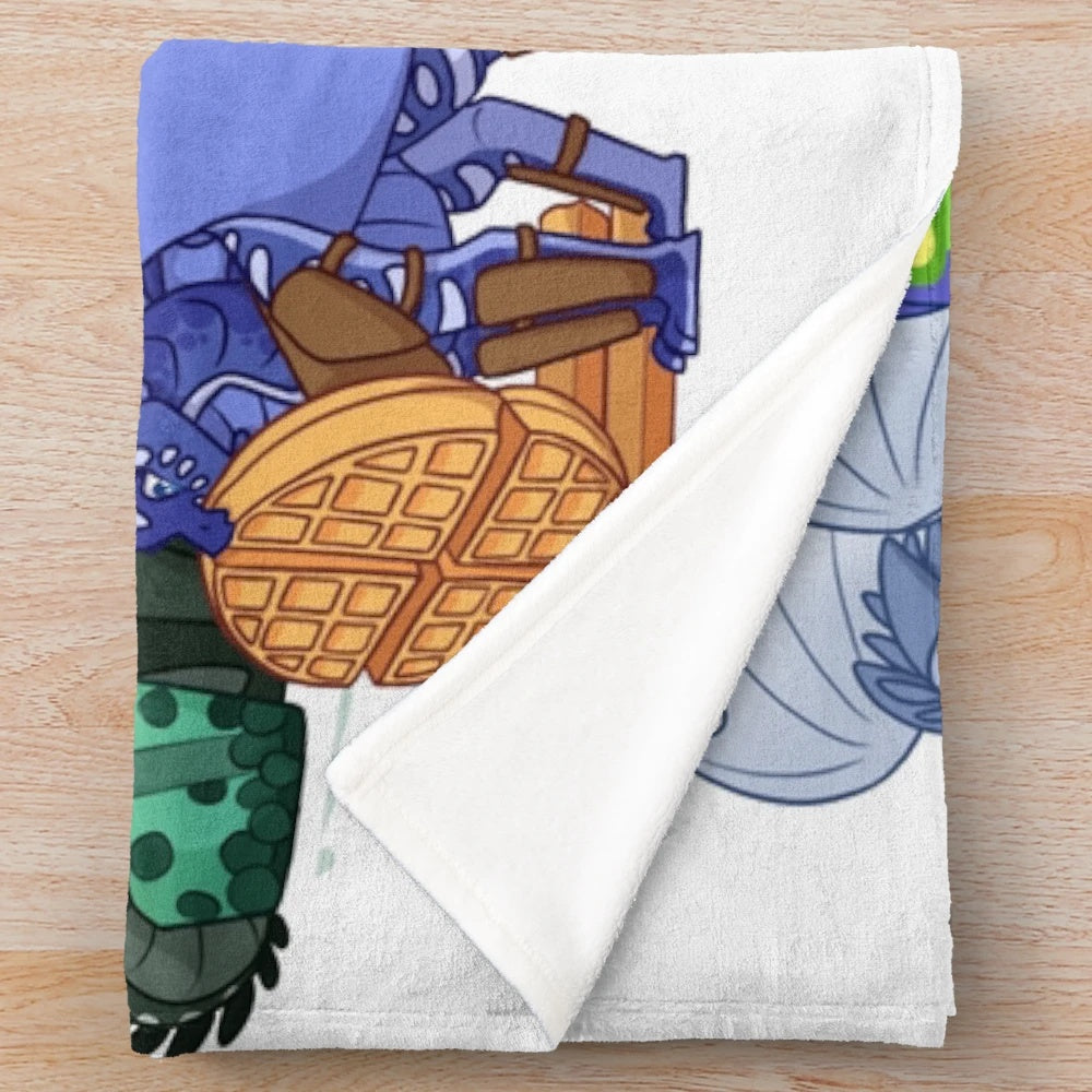 Plush blanket featuring dragon artwork inspired by the Wings of Fire book series