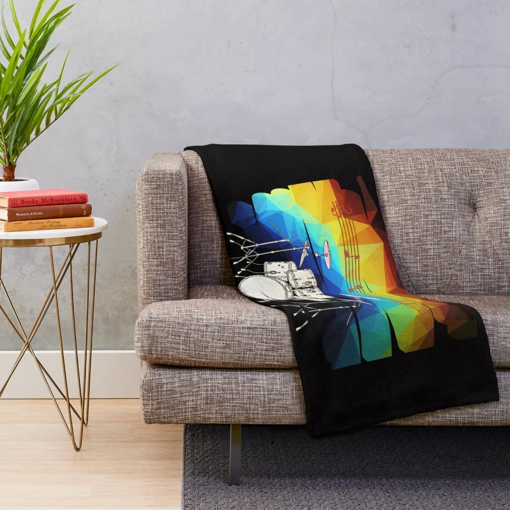 Plush blanket with drumming and musical design