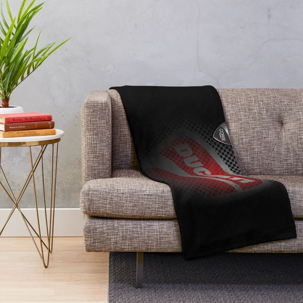 Ducati Corse-inspired plush blanket with motorcycle logo
