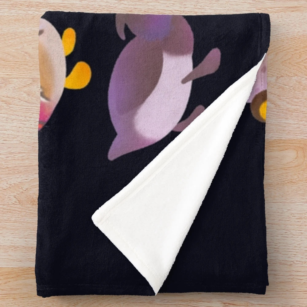 A plush blanket featuring a duck and duckling design, perfect for cozy, rustic home decor.