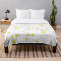 Soft and cuddly duck print plush blanket for cozy home decor
