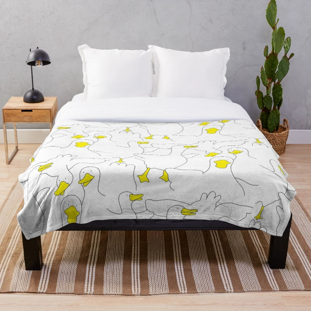 Soft and cuddly duck print plush blanket for cozy home decor