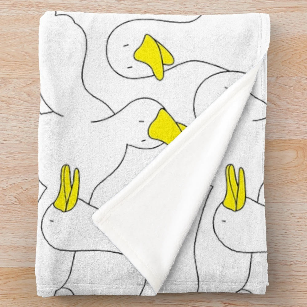Soft and cuddly duck print plush blanket for cozy home decor