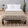 Plush blanket with a Big Lebowski-inspired cardigan print design