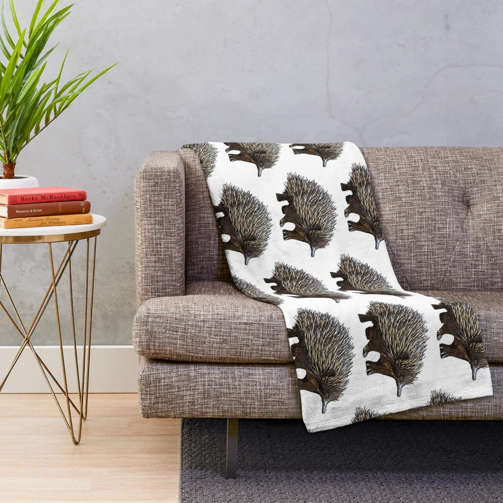 Soft and cuddly echidna plush blanket with detailed spiny design