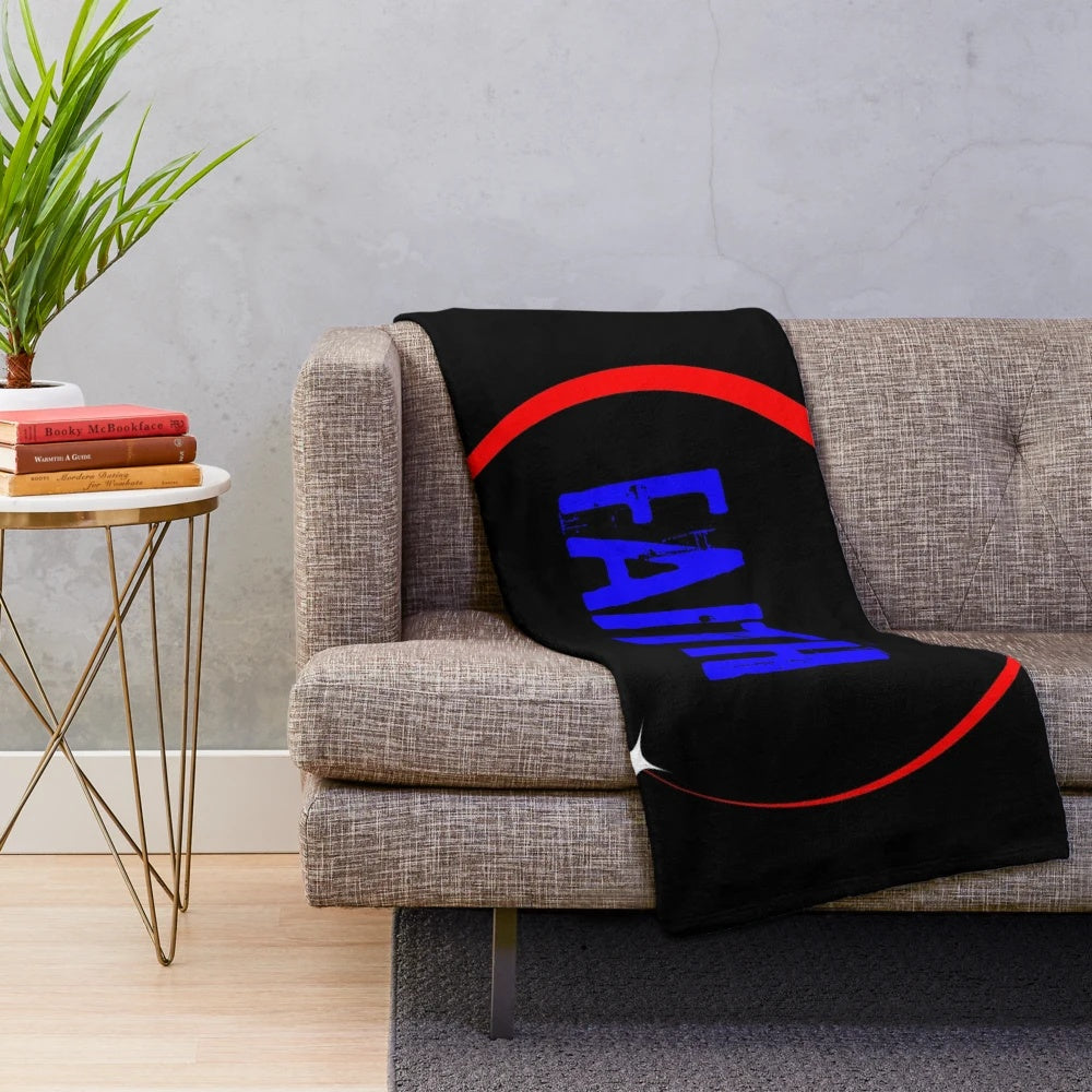 Cozy plush blanket in red and blue with an eclipse design