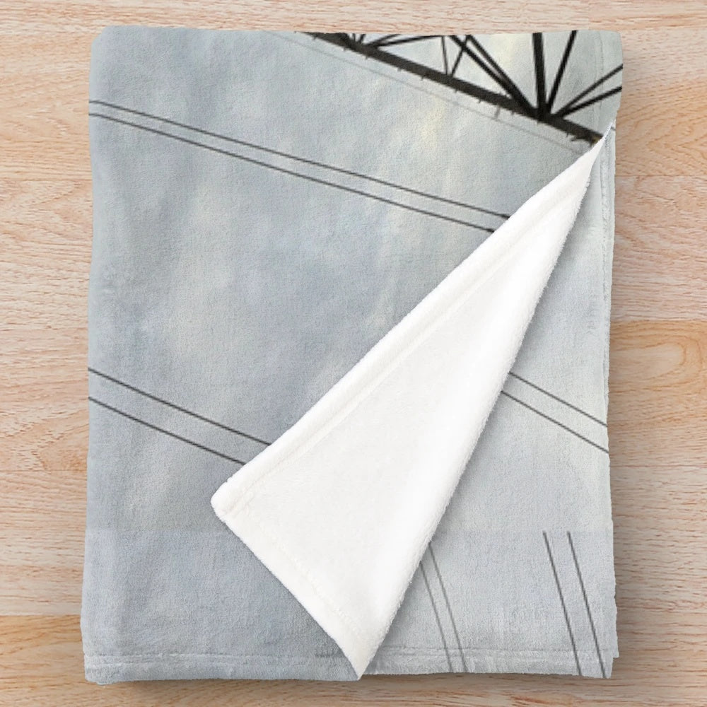 Cozy plush blanket featuring an electricity pylon design