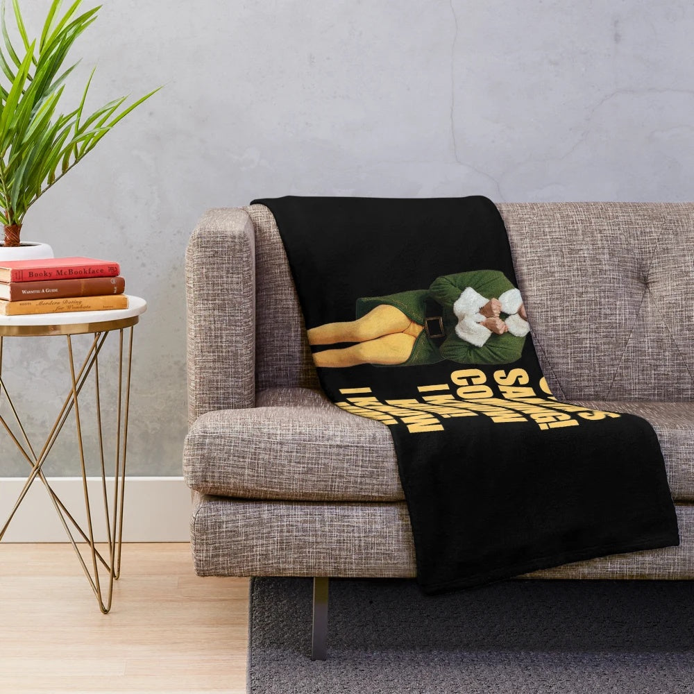 A soft and cozy plush blanket featuring the beloved character Buddy the Elf from the popular Christmas movie Elf.