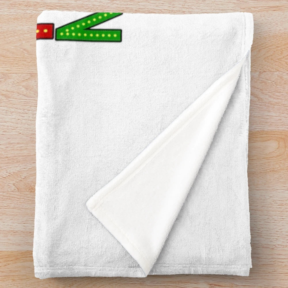 Elf-inspired plush blanket featuring the "Cotton Headed Ninny Muggins" quote from the Christmas movie