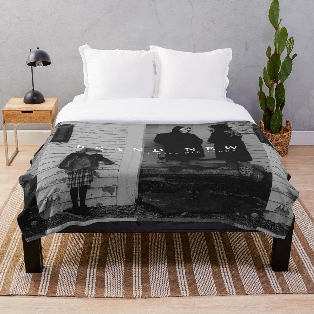 Cozy emo-inspired plush blanket featuring band lyrics and alternative aesthetic