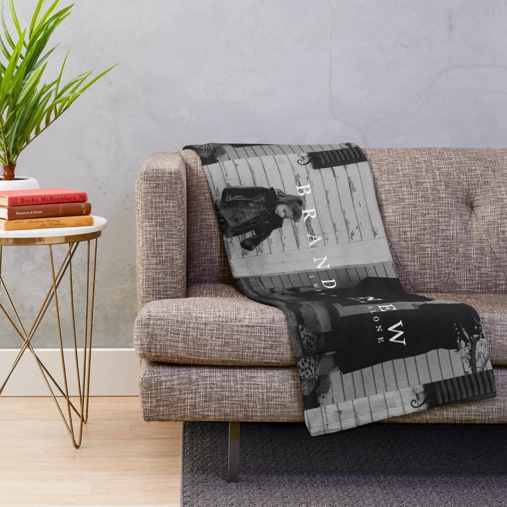 Cozy emo-inspired plush blanket featuring band lyrics and alternative aesthetic